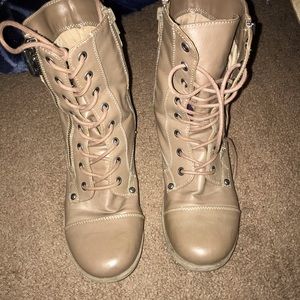 Tan lace-up boots